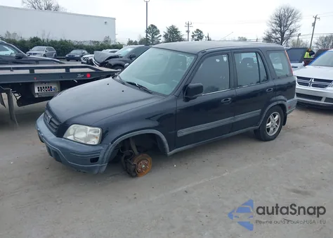 1999 Honda Cr-V Ex z USA, uszkodzony, nr VIN JHLRD1860XC029391